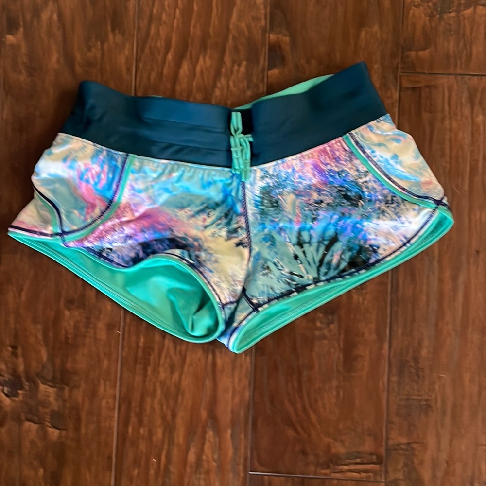 Adorable ivviva/Lululemon reversible girls swim shorts. 
size 10. $50. NWOT